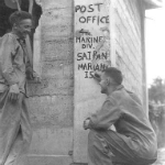 Saipan, July 1944, Two Marines having a little fun.