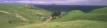 smugglers cove on santa cruz island with anacapa island in the distance   timhaufphotography.com