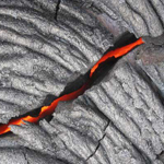molten lava visible through crack in rock