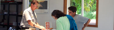 Ranger Byron Cook helps some visitors decide what to do during their vist to Kipahulu.