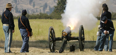 Howitzer firing.