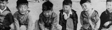 Boys playing in the field by the nursery school. Photo by Francis Stewart.