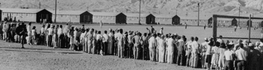Baseball game and spectators. Photo by Dorothea Lange.