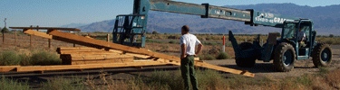 Manzanar staff reconstructing guard tower, September, 2005. NPS Photo.