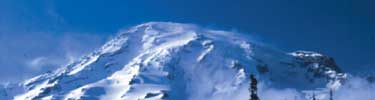 Mount Rainier with blowing snow.