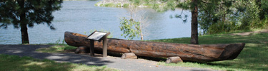Replica dugout canoe at Canoe Camp site with Clearwater River in the background