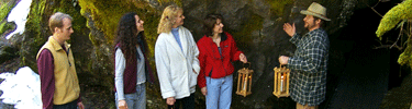 Visitor start to enter the cave during the candle light tour.