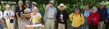 Visitors on the Earthquake Trail learning about the 1906 Earthquake from a ranger