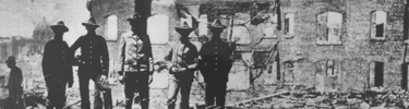Soldiers amidst the rubble in 1906