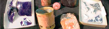 Items dug up during the 2008 renovation of the Aquatic Park Bathhouse building include Orangeade bottle cap, tobacco pouch, cat food can.
