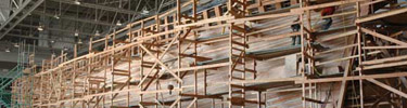 New 80 foot long hull planks were attached using steel spikes and locust wood trunnels.