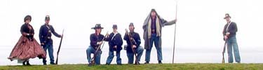 Members of a 3rd Artillery battery pose with their gun during the crisis.