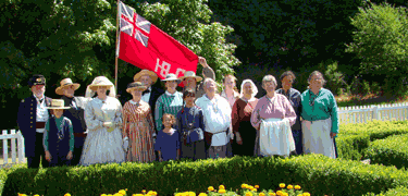 Re-enactors in the English Camp formal garden during Encampment 2009.