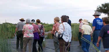 Ranger leading walk through the Doan Creek restoration project in 2008.