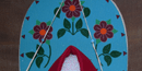 Tradition Cradleboard design of roses protected the child from evil spirits.