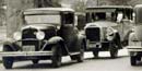Photo of cars from the early 1900s.