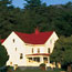 white building at Fort Baker with red roof