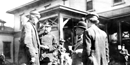 Gen. Funston and other leaders meeting on a lawn at Fort Mason