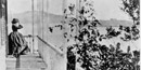 Jessie Fremont on her porch at her home at Fort Mason
