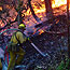 Firefighter battling the Tam Fire