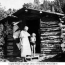 Woman & Child at Cabin