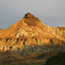   Image of Sheep Rock with the sun shining on it