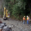 men & bulldozer working