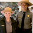 two rangers standing side by side in doorway