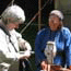 Weaver Judy Bridges and a visitor.