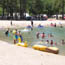 Sunbathers and waterplay at Brandy Creek Beach.