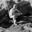 worker with shovel at archeological dig