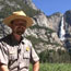 Ranger and a waterfall