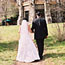 Bride and groom walking toward The Ahwahnee