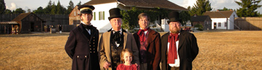 Staff and volunteers pose during the annual Candlelight Tour special event