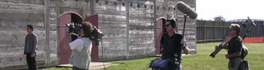 Image of a film crew filming inside the fort