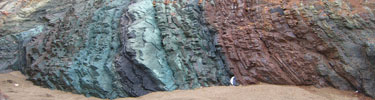 Multicolored tilted layers of radiolarian chert on Rodeo Beach