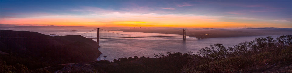 View of the Golden Gate Bridge, taken from the Marin Headlands, looking towards San Francisco at sunrise.