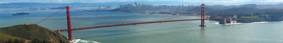 View of the Golden Gate Bridge, taken from the Marin Headlands, looking across the bay back towards San Francisco, seen in the distance.