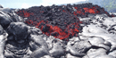 `a`a flowing over an older flow of pahoehoe. `a`a flowing over an older flow of pahoehoe.