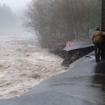 Extreme erosion damage to a road during the November 2006 flood.