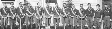 Climbing guides pose in front of the Paradise Guide House in the early 1900s