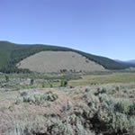 A view of Big Hole National Battlefield from the visitor center, looking toward the village site.