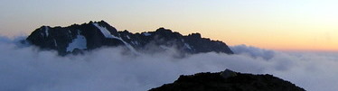 Sunrise on Johannesburg and valley fog, from Sahale Glacier Camp