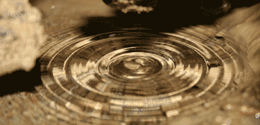 Water drops into a pool inside Oregon Caves