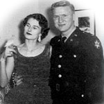 Submitted photo of soldier with wife and bird.
