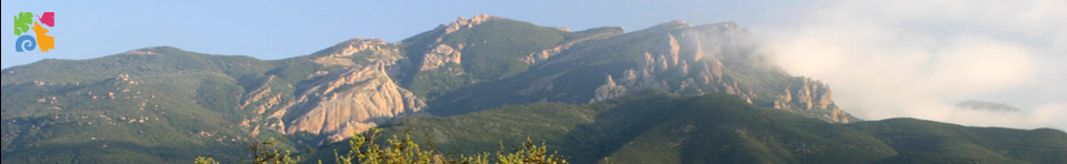 Afternoon clouds cover the distance peaks of the iconic Boney Mountain