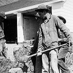 Civilian Conservation Corps (CCC) members build rock walls around the Fish and Wilife Visitor Center.