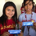 Mauka Lani Elementary students display their USS Arizona Memorial tickets.
