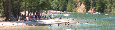 Visitors enjoying a sunny day at Brandy Creek Beach.