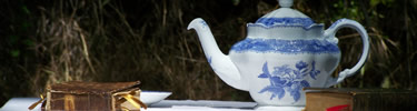 Ceramic teapot and hymnal
